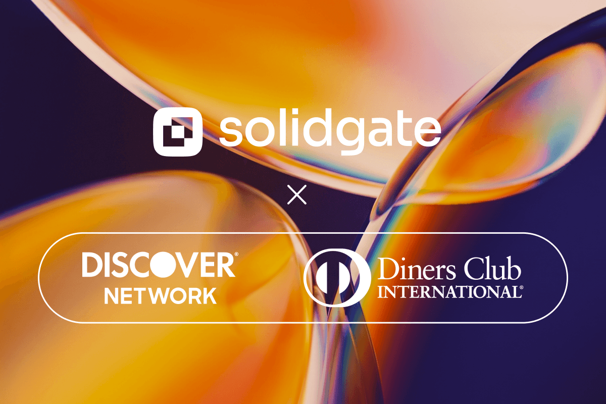 Solidgate, Discover Network, and Diners Club International logos signifying a new partnership.