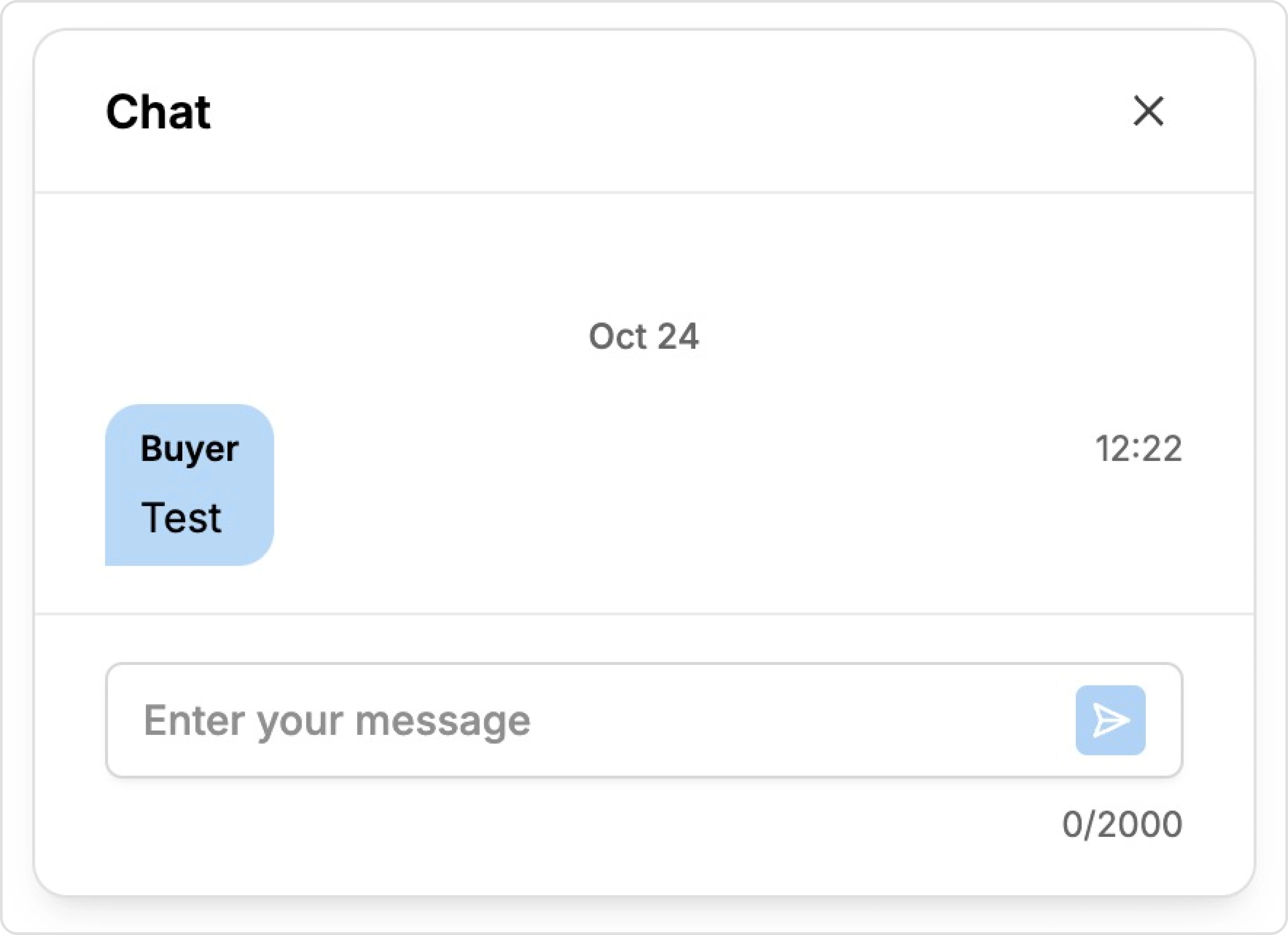 Chat interface showing a test message, timestamped October 24 at 12:22, with an input field for sending new messages.
